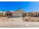 Charming single-Gathering home with desert landscaping and a two-car garage on a clear day at 1449 E Kent Ave, Chandler, AZ 85225