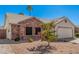 Charming single-Gathering home with desert landscaping and a two-car garage on a clear day at 1449 E Kent Ave, Chandler, AZ 85225