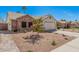 Charming single-Gathering home with desert landscaping and a two-car garage on a clear day at 1449 E Kent Ave, Chandler, AZ 85225