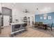Open concept kitchen with breakfast bar and view to the dining room at 1449 E Kent Ave, Chandler, AZ 85225