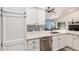 Modern kitchen with stainless steel appliances, and white cabinetry at 1449 E Kent Ave, Chandler, AZ 85225