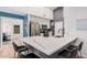 Kitchen with white countertops and bar seating at 1449 E Kent Ave, Chandler, AZ 85225