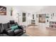 Spacious living room boasts with a large sectional and recessed lighting at 1449 E Kent Ave, Chandler, AZ 85225