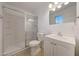 Bathroom featuring tile flooring, a glass-enclosed shower, and a modern vanity at 1619 E Del Rio Dr, Tempe, AZ 85282