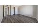 An empty bedroom is ready to furnish and features durable floors, neutral walls, and a closet at 1619 E Del Rio Dr, Tempe, AZ 85282