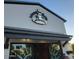 Attractive exterior view of Barrio Queen restaurant with eye-catching logo and entrance at 1619 E Del Rio Dr, Tempe, AZ 85282