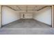 Spacious two-car garage offering ample parking and storage space with utility connections at 1619 E Del Rio Dr, Tempe, AZ 85282