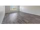 Bright living room with modern flooring and ample natural light from the windows at 1619 E Del Rio Dr, Tempe, AZ 85282