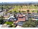 Aerial view of the property highlighting mature trees and nearby golf course at 1624 W Thomas Rd, Phoenix, AZ 85015