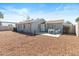 Backyard showing a charming patio area and low maintenance landscaping at 1624 W Thomas Rd, Phoenix, AZ 85015