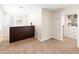 Reception area with tile flooring, featuring a dark wood reception desk and neutral walls at 1624 W Thomas Rd, Phoenix, AZ 85015