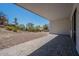 Covered patio with an expansive desert landscape, a wall, and privacy in the backyard at 16405 N Cobblestone Ln, Fountain Hills, AZ 85268