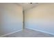 A bright bedroom with gray walls and white trim and tile flooring at 16405 N Cobblestone Ln, Fountain Hills, AZ 85268