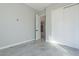 Bedroom featuring tile flooring, gray walls, white trim, and closet with sliding doors at 16405 N Cobblestone Ln, Fountain Hills, AZ 85268