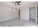 Large bedroom with tile floors, neutral paint, fan, and natural light at 16405 N Cobblestone Ln, Fountain Hills, AZ 85268