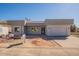 Modern single-story home featuring a neutral stucco finish and paved driveway at 16405 N Cobblestone Ln, Fountain Hills, AZ 85268