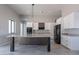 Bright kitchen featuring a large island with granite countertops, and modern appliances at 16405 N Cobblestone Ln, Fountain Hills, AZ 85268