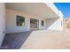 This patio has a beautiful brick floor and is surrounded by elegant windows, bringing an outdoor experience to the space at 16405 N Cobblestone Ln, Fountain Hills, AZ 85268