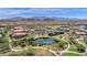 Aerial view of community center, park, and mountain views in this amazing neighborhood at 17002 S 178Th Ave, Goodyear, AZ 85338