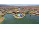 Aerial view featuring a community pool area, well-manicured lawns and landscaping at 17002 S 178Th Ave, Goodyear, AZ 85338