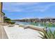 A scenic backyard with a waterway view and manicured landscaping, perfect for relaxing at 17002 S 178Th Ave, Goodyear, AZ 85338