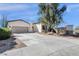 Attractive single-story home with a two-car garage and desert landscaping at 17002 S 178Th Ave, Goodyear, AZ 85338