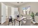 Functional office space featuring a modern ceiling fan and natural light at 17002 S 178Th Ave, Goodyear, AZ 85338
