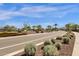 Well-maintained street featuring lush landscaping and sidewalks in a beautiful community at 17002 S 178Th Ave, Goodyear, AZ 85338