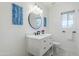 Bathroom featuring marble floors, a toilet, and a modern-style vanity with marble countertop and a black faucet at 17241 N 16Th Dr # 1, Phoenix, AZ 85023