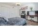 Comfortable bedroom with hardwood floors, neutral decor, and ample closet space at 17241 N 16Th Dr # 1, Phoenix, AZ 85023