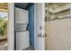 A practical laundry setup with a stacked washer and dryer unit, conveniently located near the back entrance at 17241 N 16Th Dr # 1, Phoenix, AZ 85023
