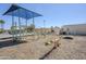 Community playground with diverse equipment including climbing, rotating, and spring-mounted features at 17241 N 16Th Dr # 1, Phoenix, AZ 85023