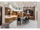 Gourmet kitchen with a large island, custom cabinetry, and modern appliances at 18116 N 14Th St, Phoenix, AZ 85022