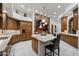 Beautiful kitchen featuring an island with seating, stainless appliances and custom cabinetry at 18116 N 14Th St, Phoenix, AZ 85022