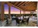 Inviting outdoor patio featuring comfortable seating, a dining area, and a stunning view of the city at 18116 N 14Th St, Phoenix, AZ 85022