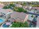 Aerial view of property from the backyard, boasting a private pool and covered patio entertainment space at 18460 E Peachtree Blvd, Queen Creek, AZ 85142