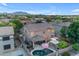 Aerial view of property showing a yard with a pool, patio area, putting green and backyard at 18460 E Peachtree Blvd, Queen Creek, AZ 85142