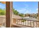 Expansive balcony view overlooking lush greenery and neighborhood charm, perfect for enjoying serene mornings and evenings at 18460 E Peachtree Blvd, Queen Creek, AZ 85142