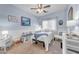 Light and airy bedroom with neutral walls, comfortable seating, and bright, natural light at 18460 E Peachtree Blvd, Queen Creek, AZ 85142