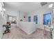 Upstairs landing featuring carpet, natural light, and views into a bedroom and lounge at 18460 E Peachtree Blvd, Queen Creek, AZ 85142