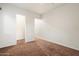 Bedroom showcasing carpet floors, baseboard trim, and neutral walls at 1874 E Crescent Way, Chandler, AZ 85249