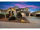 Attractive home features a well-manicured front yard, mature landscaping, and a neatly paved driveway at 1874 E Crescent Way, Chandler, AZ 85249
