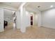 Open plan living area featuring tile flooring and an abundance of natural light at 1874 E Crescent Way, Chandler, AZ 85249