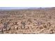 Aerial view of desert community with tile roof homes, landscaping, and mountain views at 1903 N Lynch --, Mesa, AZ 85207