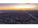 Aerial view of desert community with tile roof homes and landscape, at sunset at 1903 N Lynch --, Mesa, AZ 85207