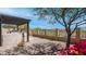 Spacious backyard featuring a built-in grill, a pergola, desert landscaping and privacy fencing at 1903 N Lynch --, Mesa, AZ 85207