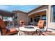 The backyard features a cozy fire pit with seating, a covered patio, and a built-in grill area for outdoor enjoyment at 1903 N Lynch --, Mesa, AZ 85207
