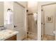 Modern bathroom featuring a glass-enclosed shower, granite counter and neutral walls at 1903 N Lynch --, Mesa, AZ 85207