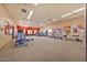The workout facility features high ceilings, carpet flooring and several pieces of fitness equipment at 1903 N Lynch --, Mesa, AZ 85207