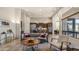 Open living area flows to the kitchen, featuring sleek stainless appliances and inviting design elements at 1903 N Lynch --, Mesa, AZ 85207